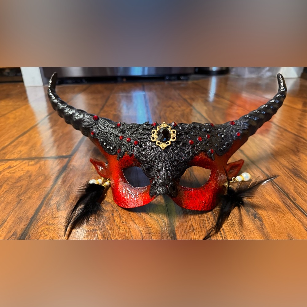 Masquerade Women’s black and red horned  mask.